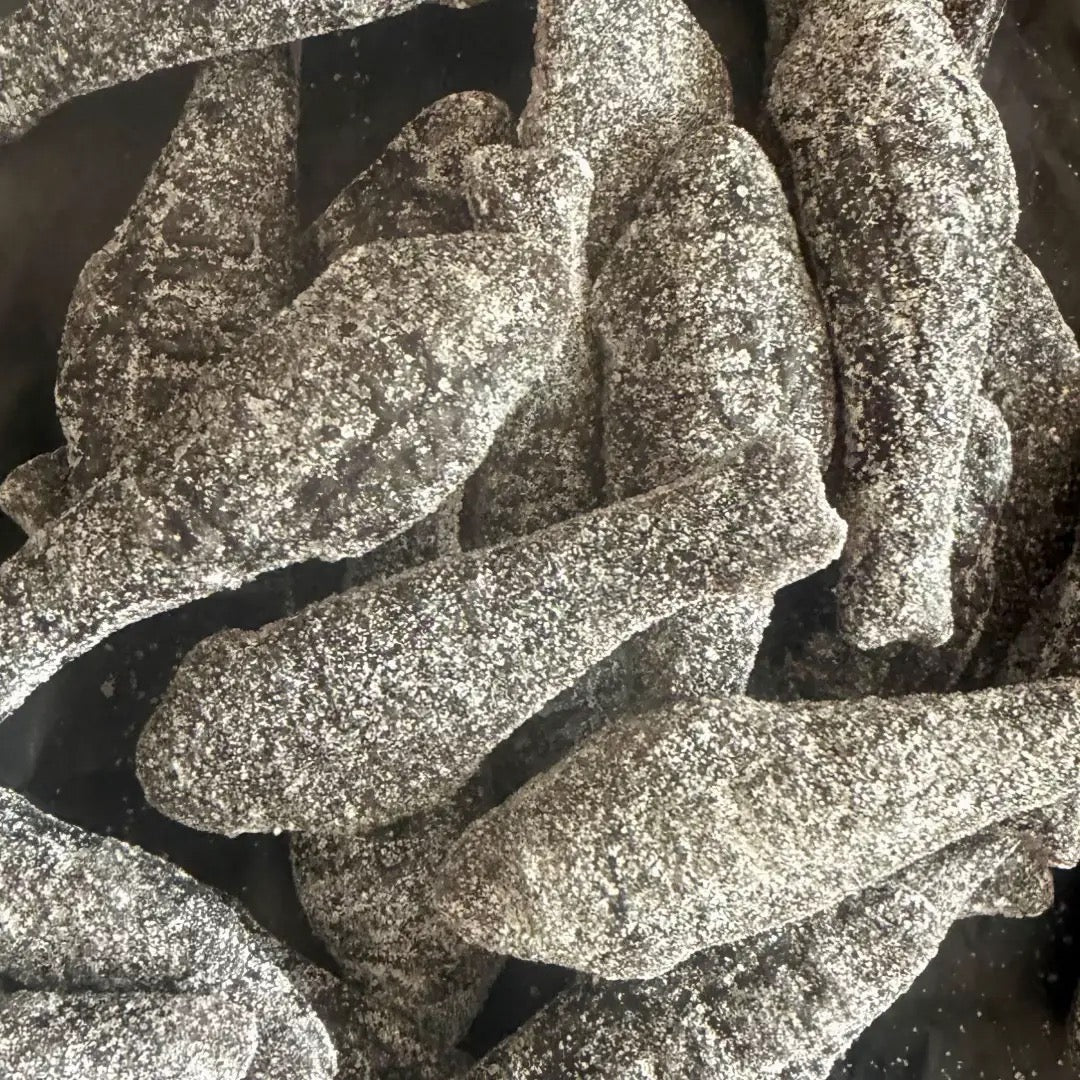 Close-up of Haribo Salt Fish – chewy sugar-coated salty liquorice herrings