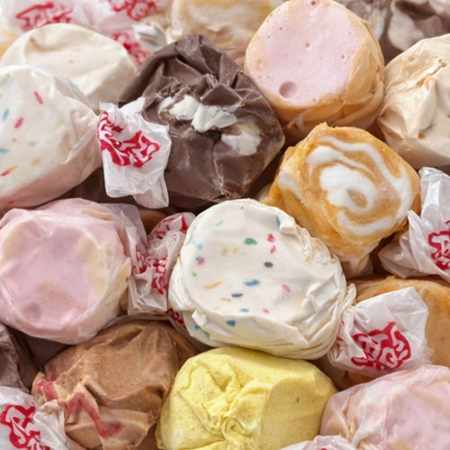 Dessert Dreams Taffy Mix — soft chewy taffy pieces in seven dessert-inspired flavours, flat lay on a pastel background by Grandma's Sweet Cupboard"
